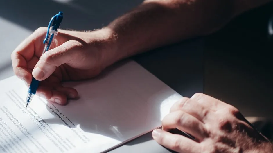 Person with emotional support dog reviewing rental documents
